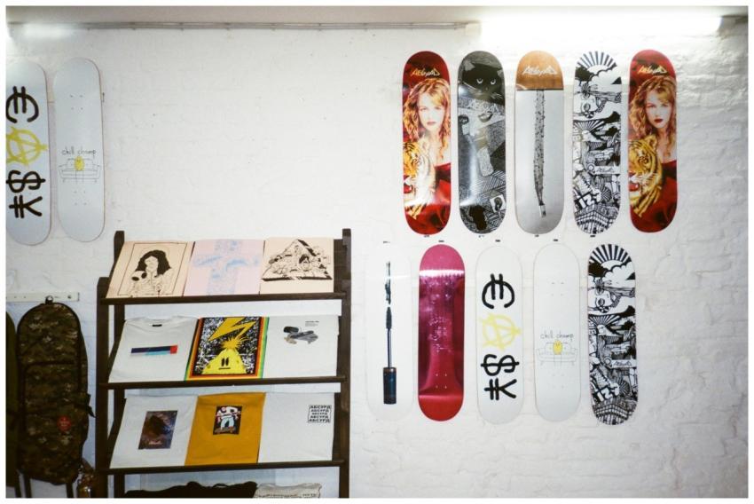 A collection of artistic skateboards and prints di