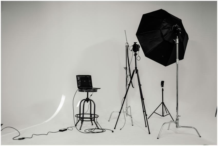 A black and white photo of a well-equipped photogr