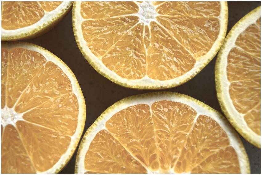 Fresh close-up image of sliced citrus fruits showc