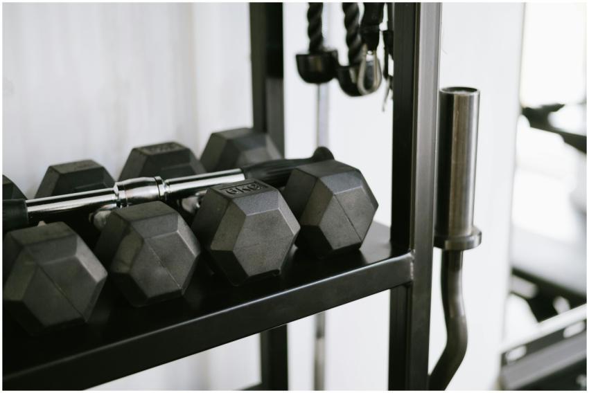 Close-up of gym equipment including dumbbells on a
