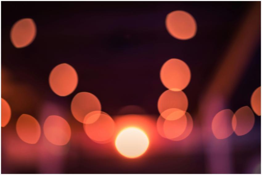 Artistic abstract bokeh lights with warm tones and