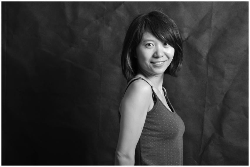 Elegant black and white portrait of a smiling woma