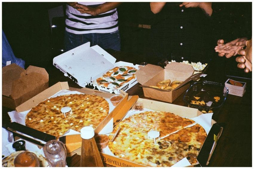 A lively indoor gathering with people enjoying a v