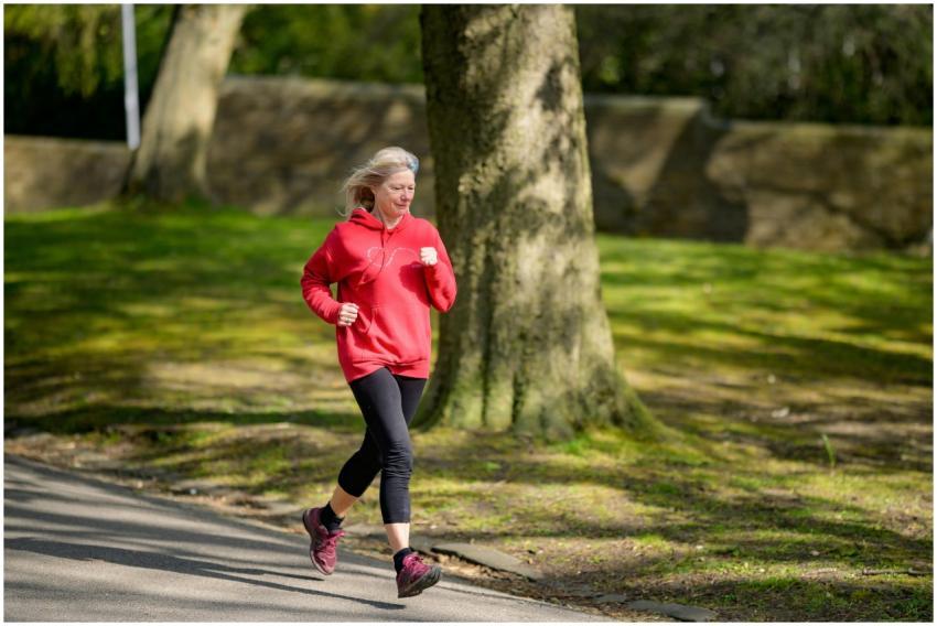 Elderly woman enjoying a healthy outdoor jog in a