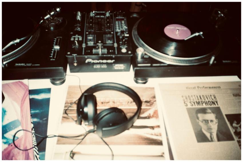 Close-up of a vintage DJ setup featuring turntable