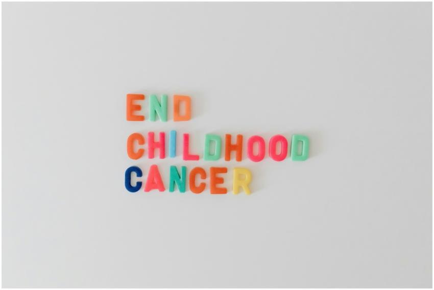 Colorful plastic letters spelling 'End Childhood C