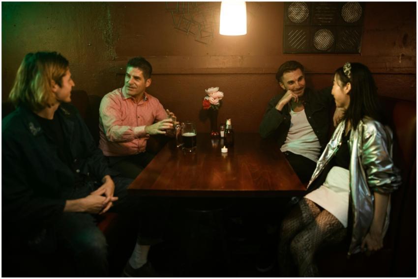 Group of friends enjoying a relaxed evening at a c