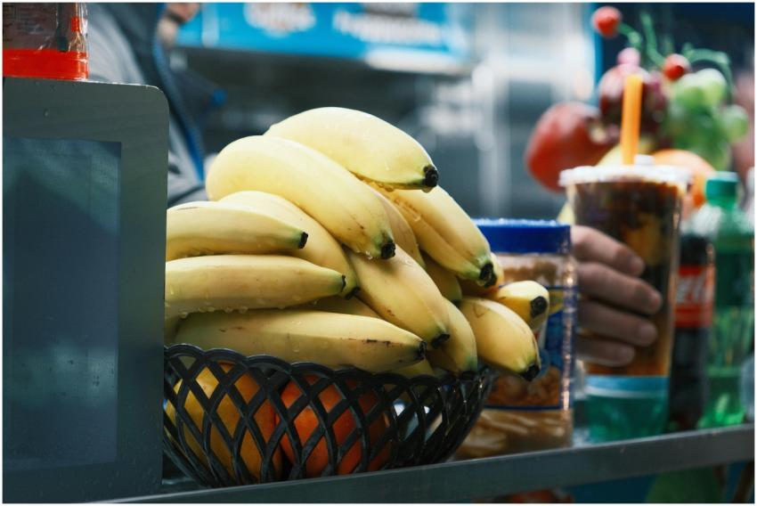 A vibrant display of bananas at a street vendor in