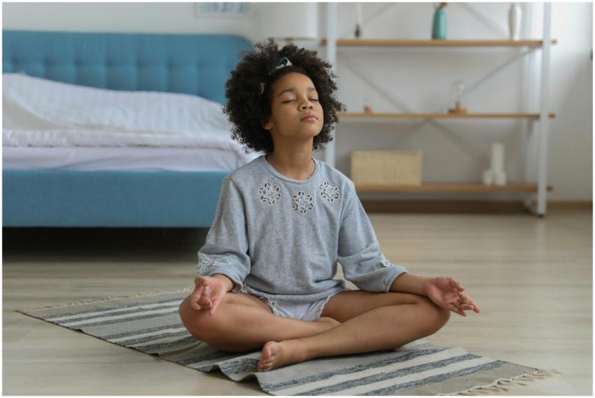Full body of African American child with curly hai