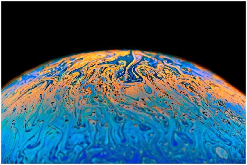 Colorful abstract image resembling a planet with s