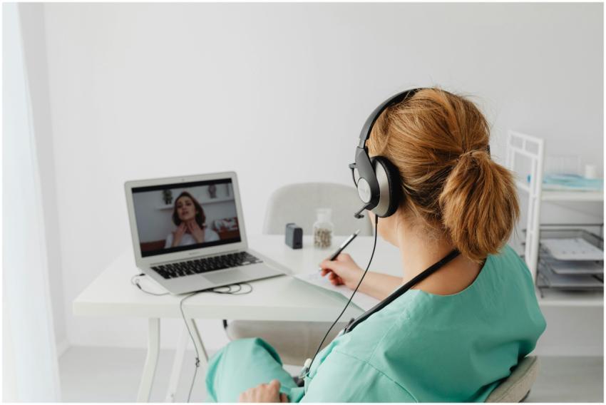 A female doctor conducts a virtual patient consult