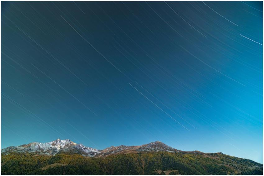 Stunning long exposure of star trails above Annivi