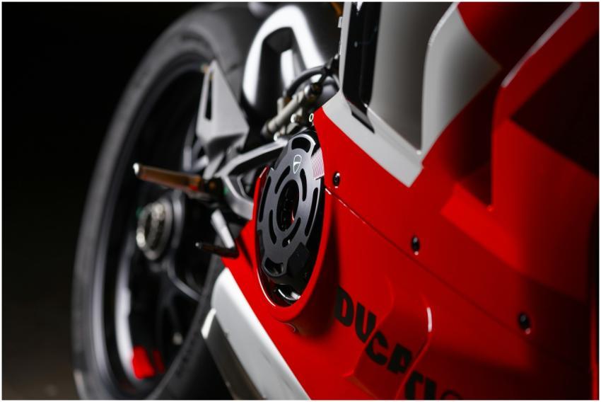 Detailed close-up of a red Ducati motorbike highli