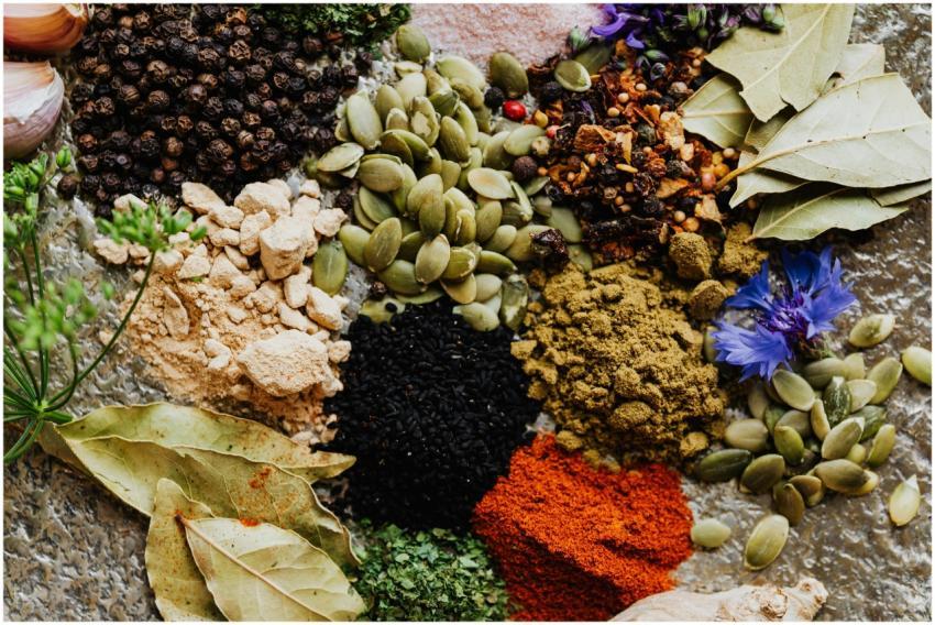 High-quality flat lay of various spices and herbs,
