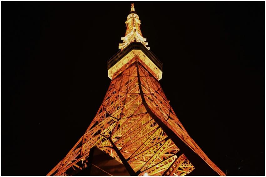 Low angle view of the illuminated Tokyo Tower at n