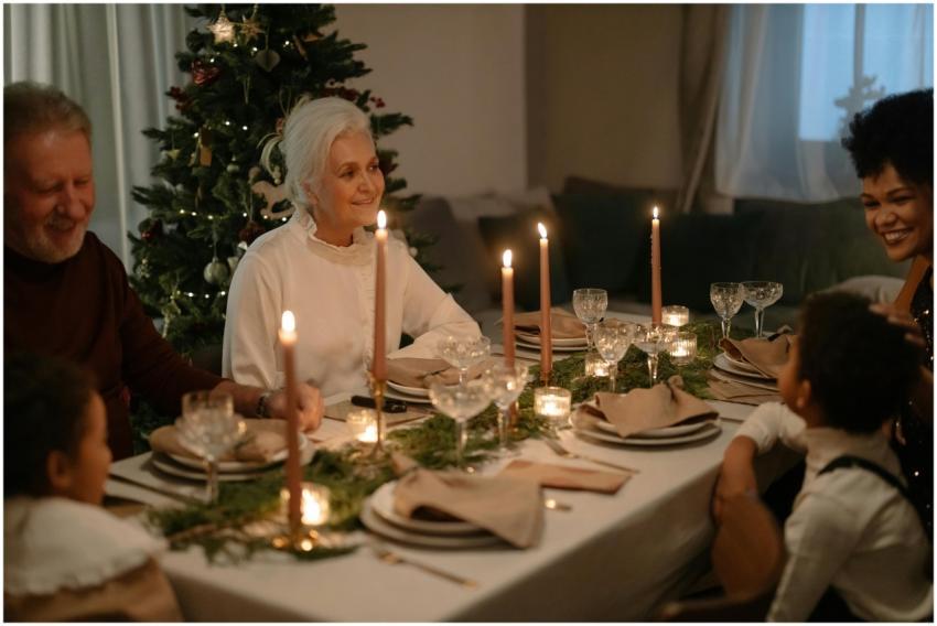 Family enjoying a festive Christmas dinner with sm
