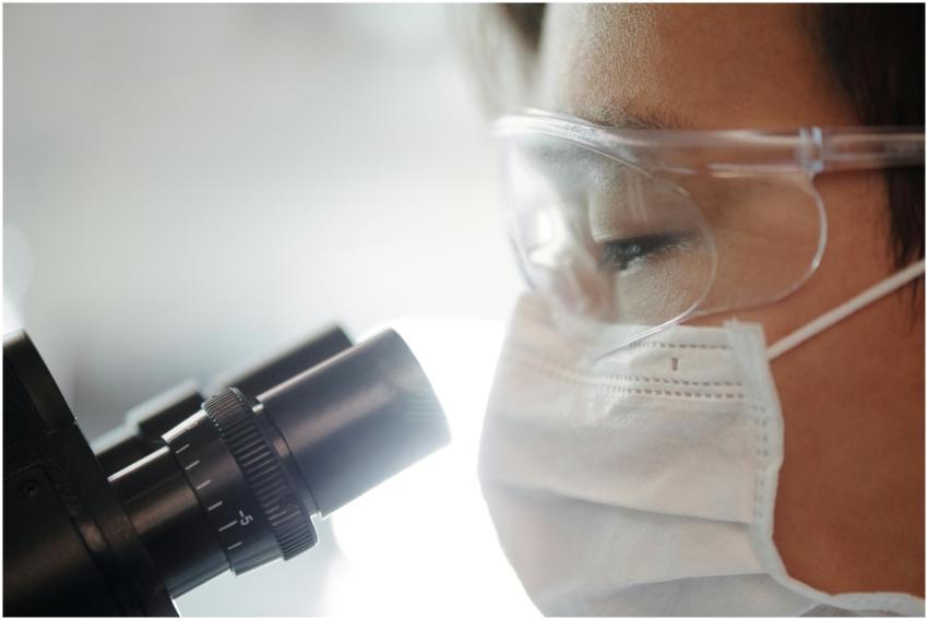 Close-up of a scientist wearing protective gear ex