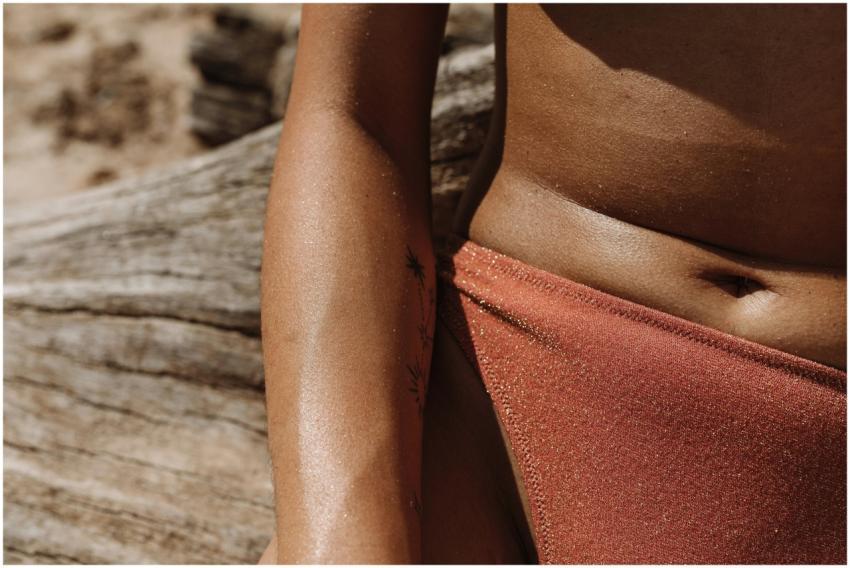 Detailed close-up of a woman in a shimmering swims