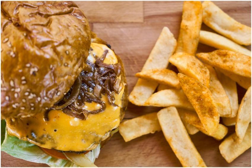 Mouth-watering cheeseburger with caramelized onion