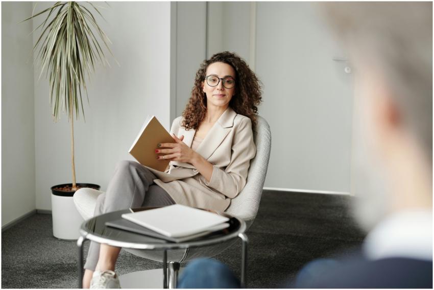 Businesswoman sitting in a modern office with a no