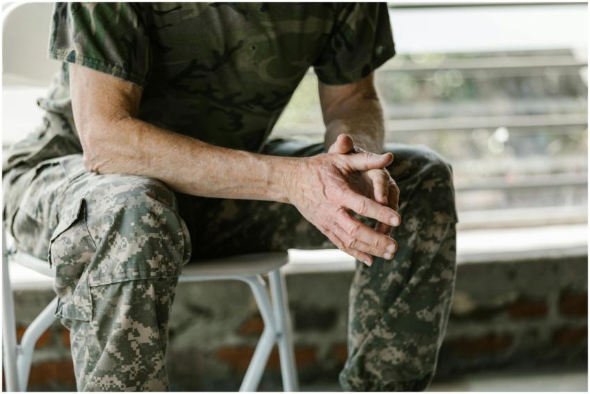 Close-up of a military veteran's hands in a therap