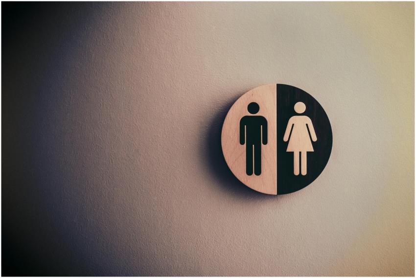 Minimalist gender neutral restroom sign with male