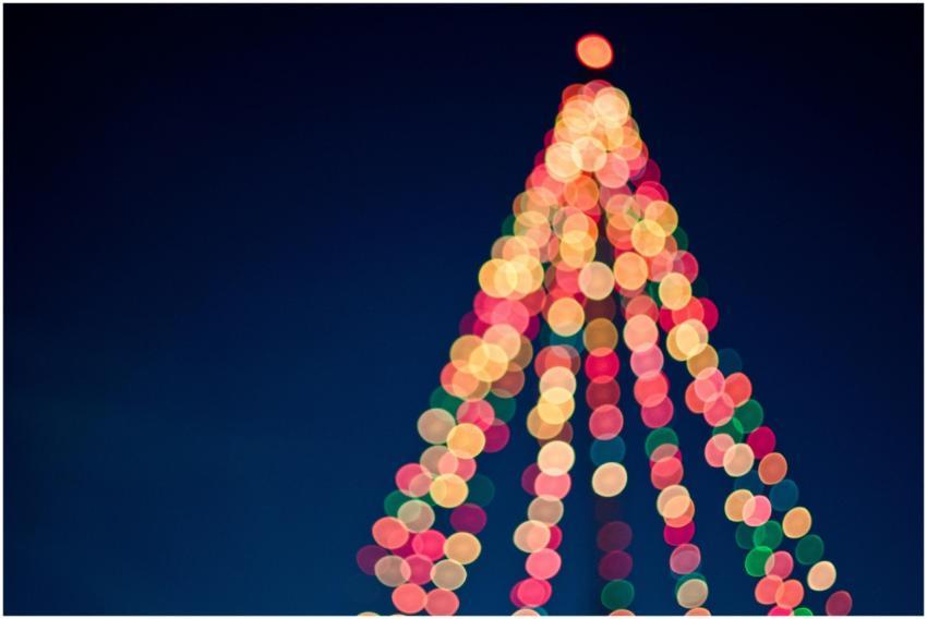 Colorful bokeh lights forming a Christmas tree aga