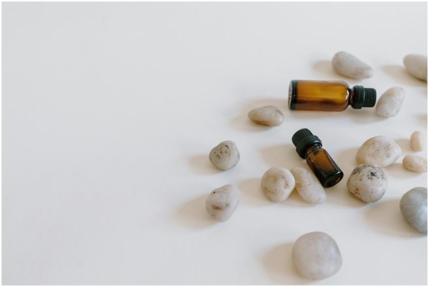 Minimalist arrangement of essential oil bottles su