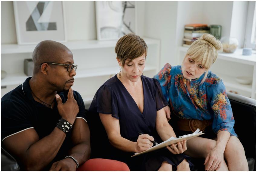 A diverse group meeting indoors, discussing mental
