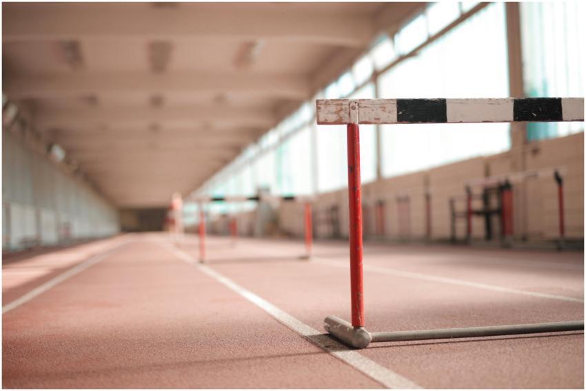 Hurdle painted in white black and red colors place