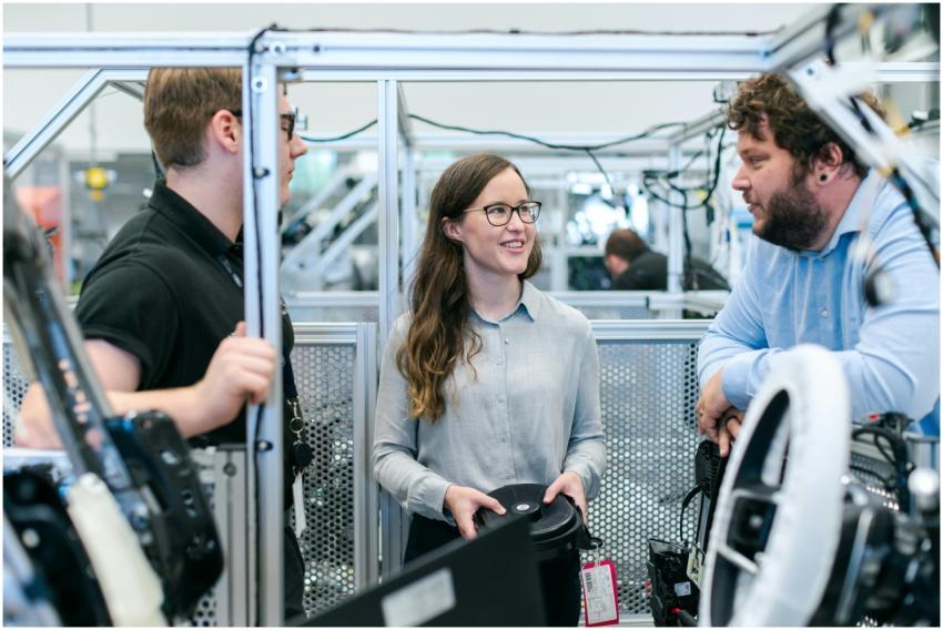 Group of engineers collaborating on a project in a