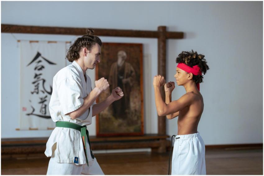 Karate instructor and student practicing martial a