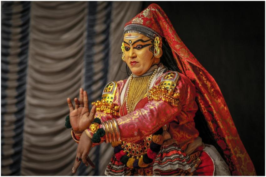 Close-up of a Kathakali dancer in traditional atti