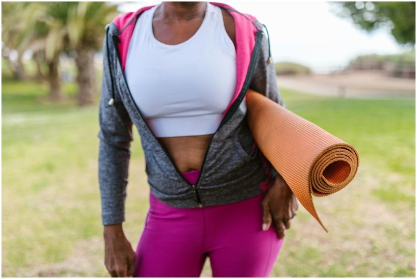 Close-up of an African American woman holding a yo