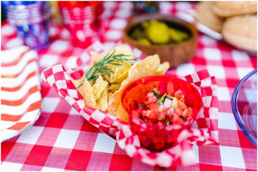 Delicious nachos with salsa served on a vibrant ch