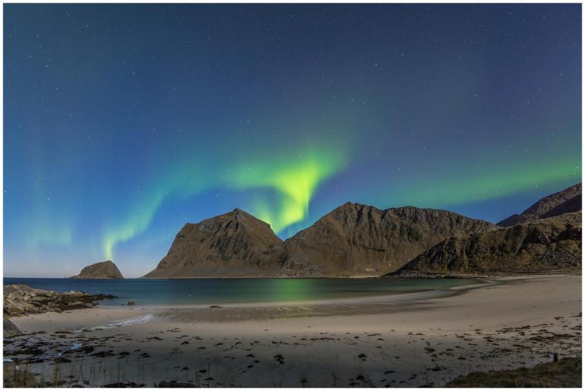 Aurora borealis illuminating the night sky over a
