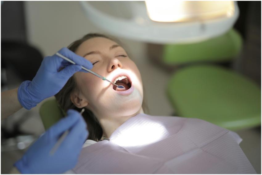 Patient receiving dental examination in a modern c