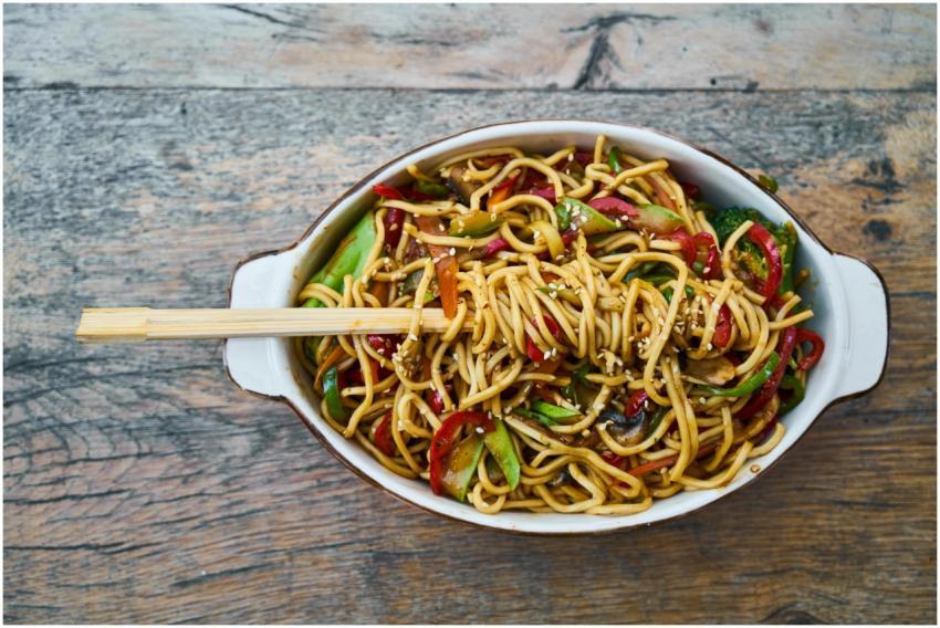 Tasty stir-fried noodles with fresh vegetables and