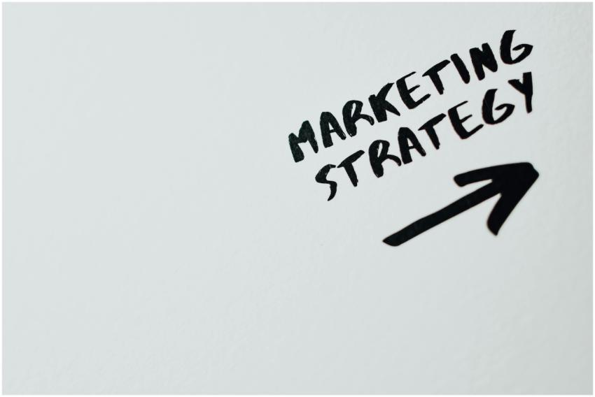 Close-up of handwritten 'Marketing Strategy' text