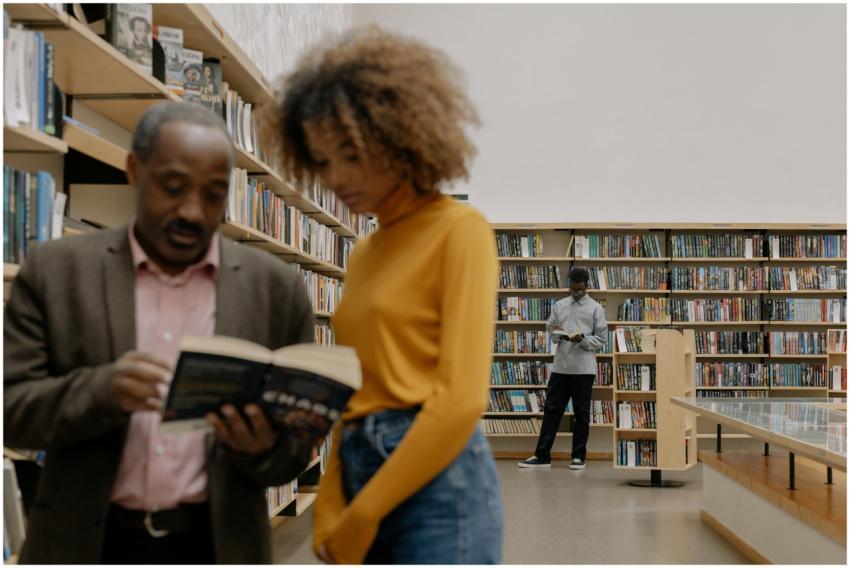 People reading and studying in a modern library se