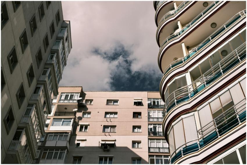 A low-angle view of modern apartment buildings in