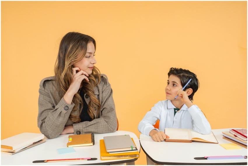 A teacher and student having an attentive discussi