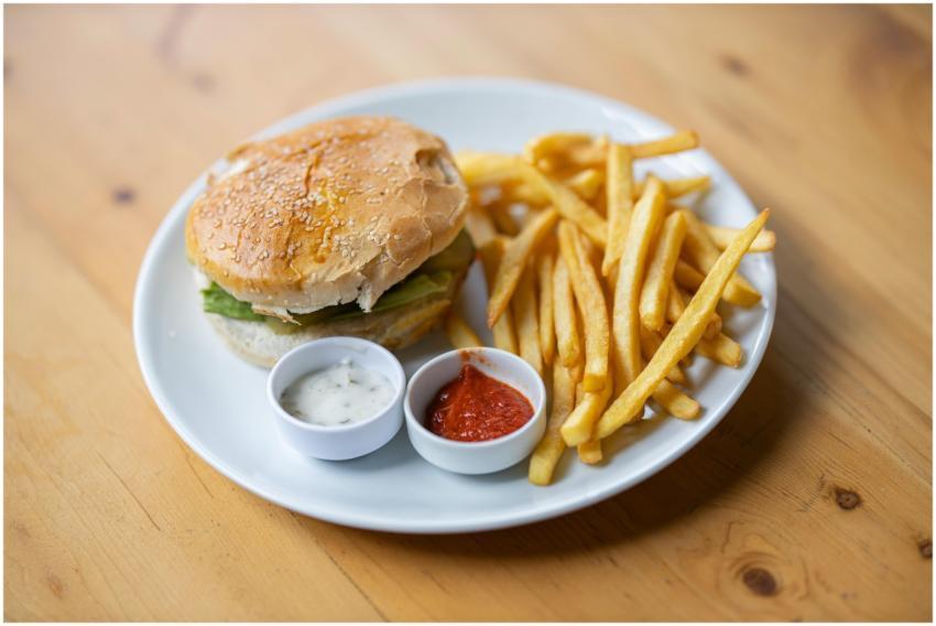 Delicious burger with crispy french fries served w