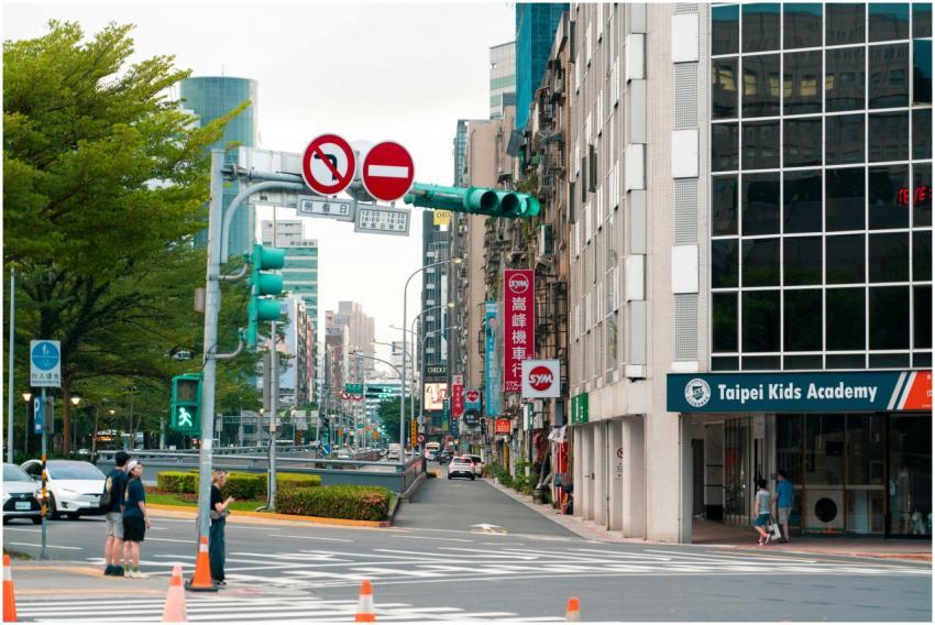 Urban scene of Taipei with traffic lights, pedestr