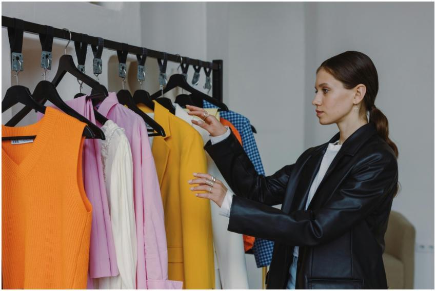 Side view of a woman browsing colorful fashion col