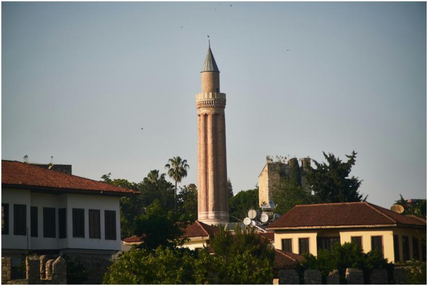A picturesque view of the Yivli Minaret amidst tra
