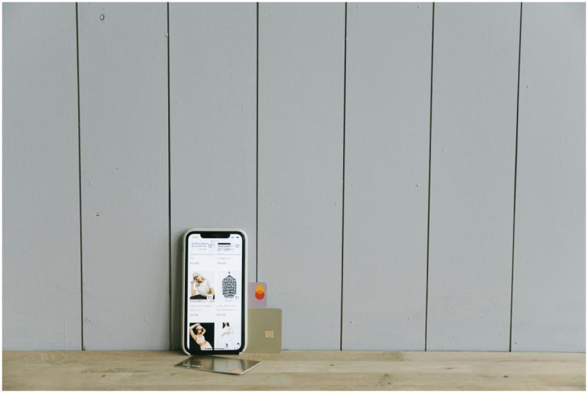 A smartphone displaying an ecommerce site with a c