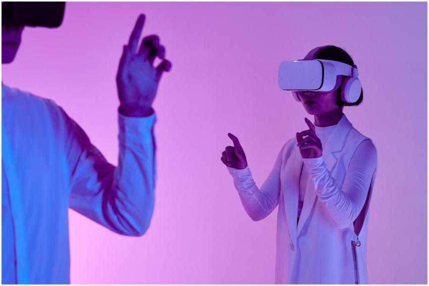 Two adults using VR headsets in a studio with vibr