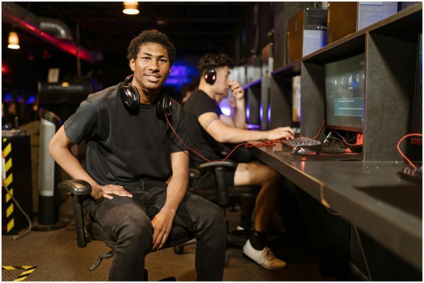 Two gamers playing at a modern gaming station, hig