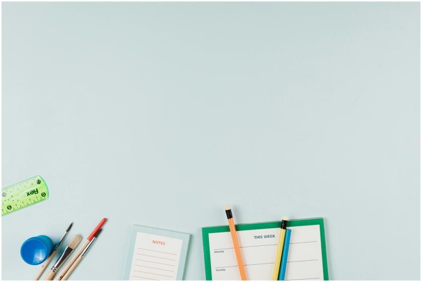 Artistic arrangement of school supplies including